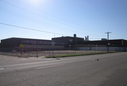 Large school building on 4 acres with 2 Gyms in Clarkfield, Minnesota. $109,000